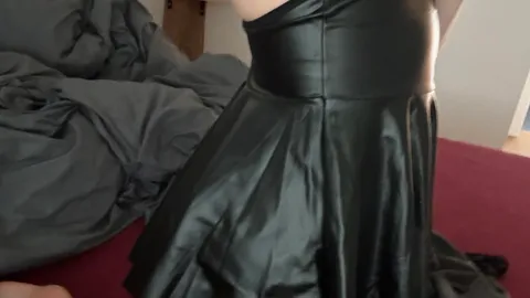 Photos in a leather mini-dress