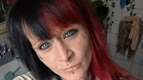 I take my clothes off and have a go at it doggy-style with the dildo