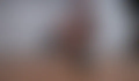 Füße in Nylons und High Heels
